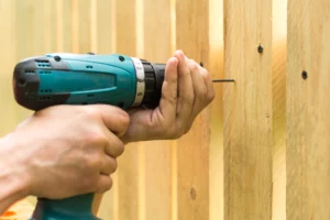 contractor installing a wooden fence hamden ct